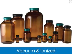 Various sizes of amber glass bottles with teal caps, labeled Vacuum & Ionized.