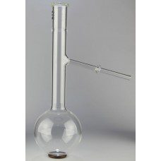 Laboratory glassware with a round bottom flask and side arm tube.