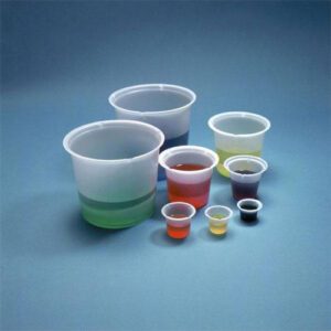 Various sizes of plastic measuring cups filled with different colored liquids.