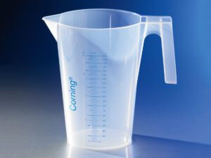 Transparent plastic measuring cup with blue markings and handle.